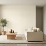 Sherwin Williams Shoji White SW 7042 warm off-white living room with natural light and neutral furnishings.
